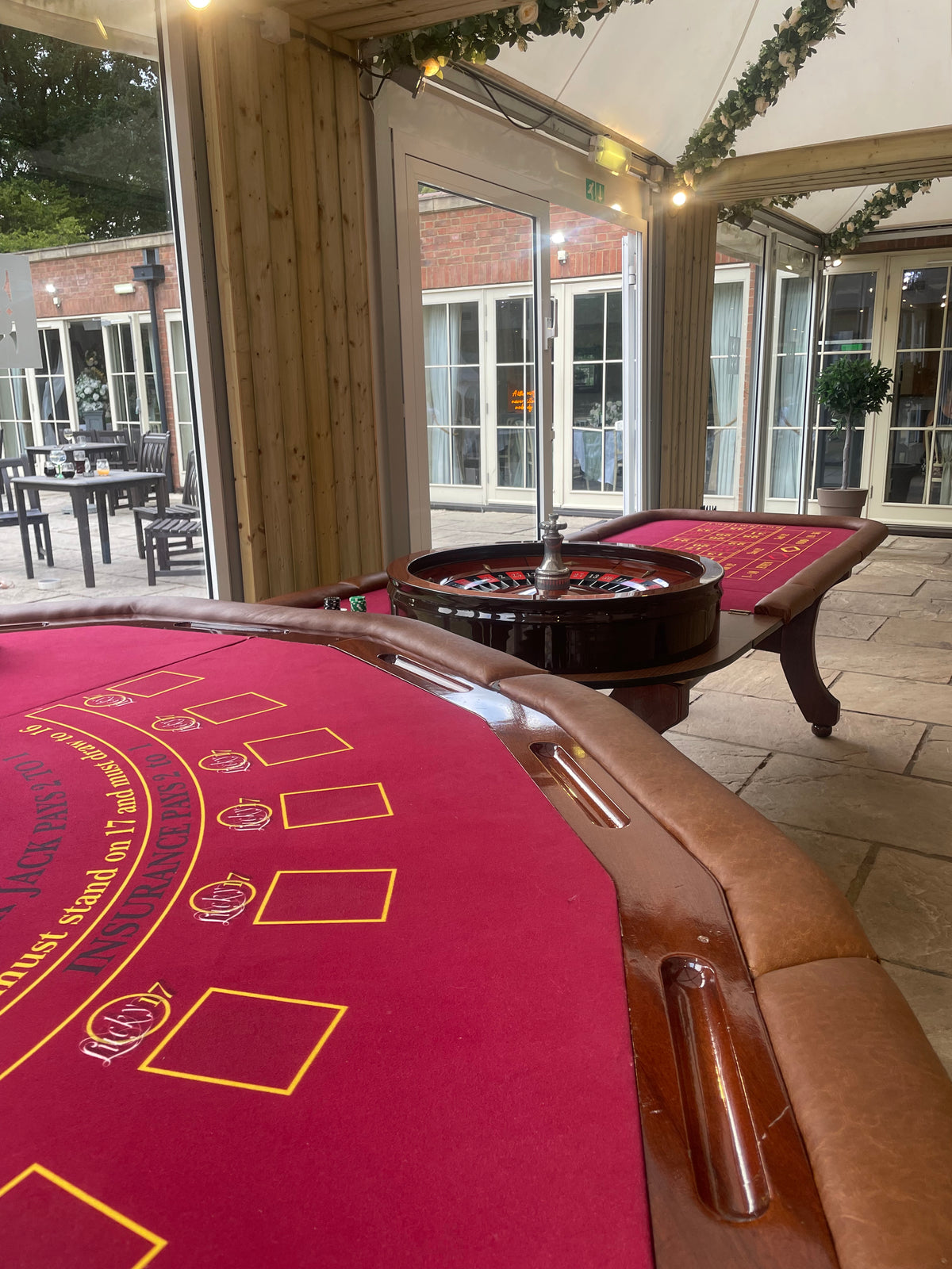 Luxury full sized roulette and blackjack table setup for a wedding at Kelham House Country Manor in Newark Nottinghamshire by Fun Casino 21